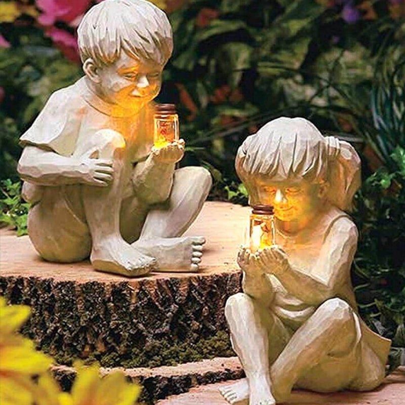 Barn Med Solar Fireflies Hagestatuer