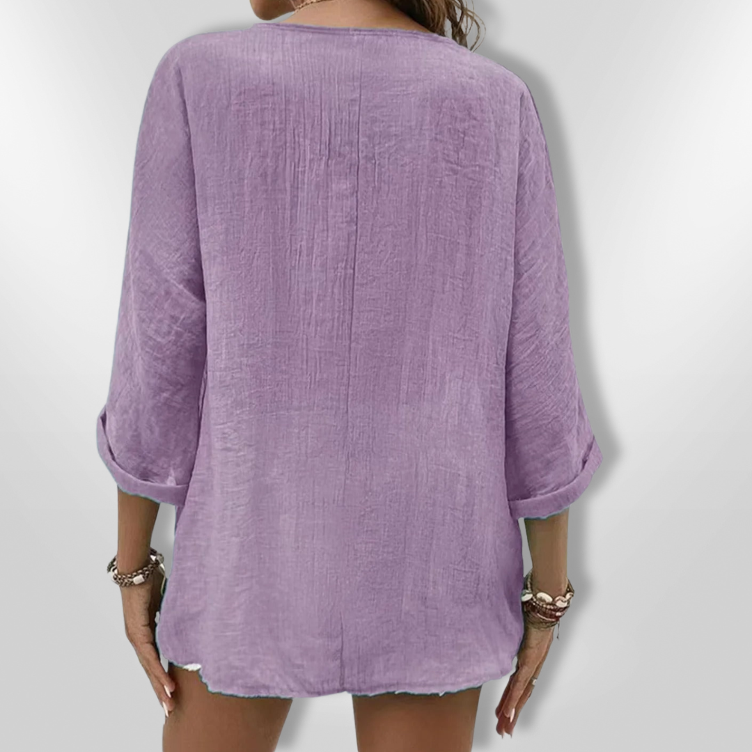 Dametopp med knapper og V-hals i lett stoff 5