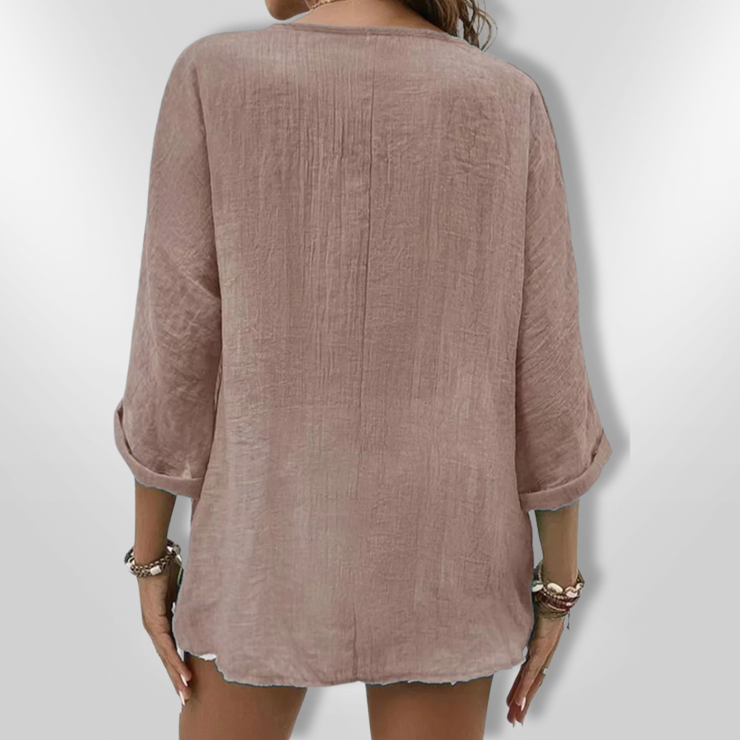 Dametopp med knapper og V-hals i lett stoff 7