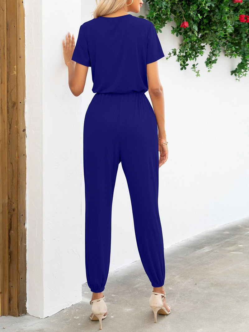 Kvinne Jumpsuit med Kort Erme V-Hals og Lommer 8