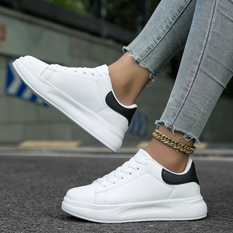 Kvinne Sneakers i Hvit Lær – Minimalistiske Fritidssko 1