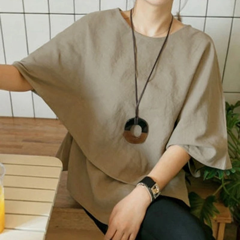 Asymmetrisk halv ermet bluse for kvinner