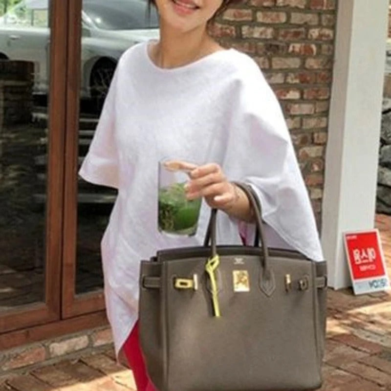 Asymmetrisk halv ermet bluse for kvinner