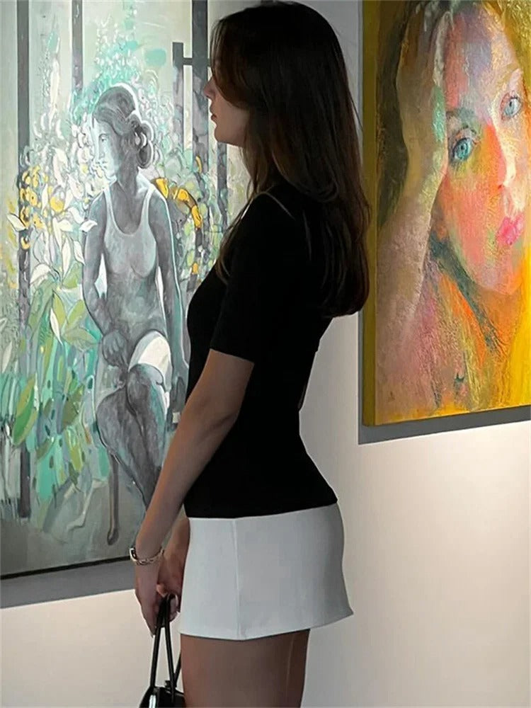 Kontrastfarget patchwork-minikjole for kvinner