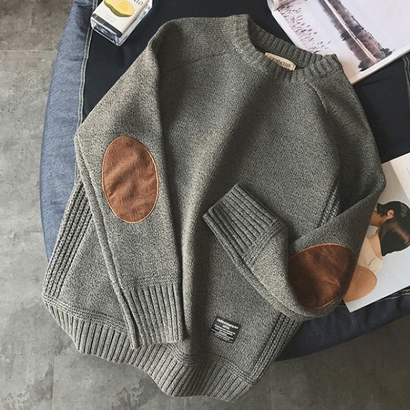 Oversized lappstrikket genser for menn