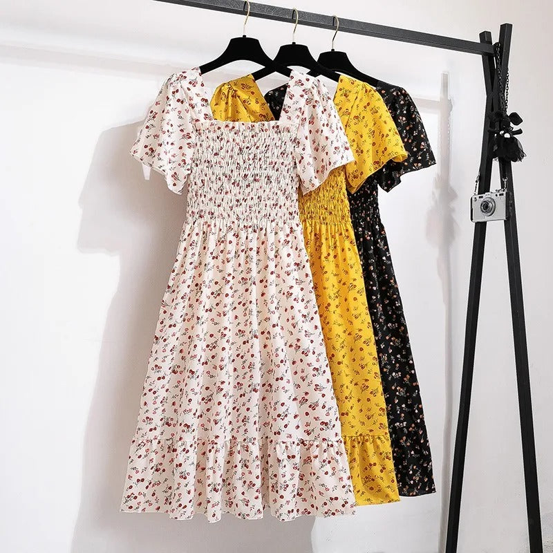 Blomstret midikjole i chiffon for kvinner