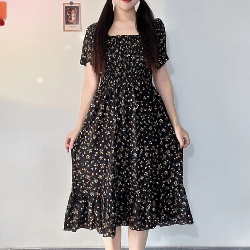 Blomstret midikjole i chiffon for kvinner