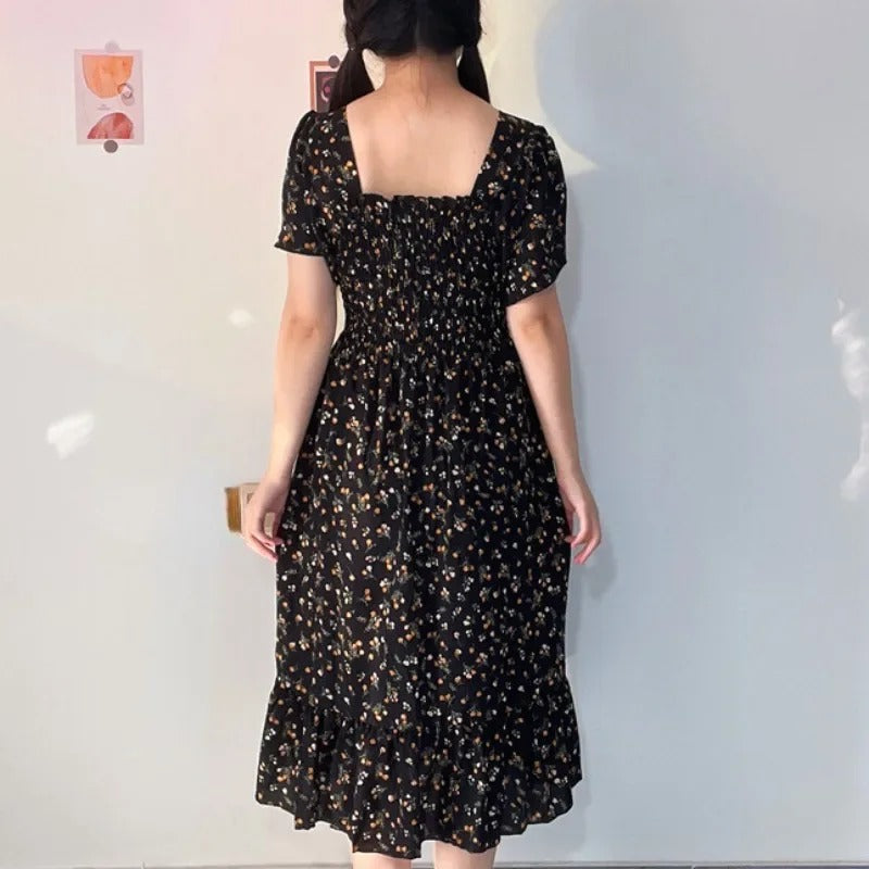 Blomstret midikjole i chiffon for kvinner