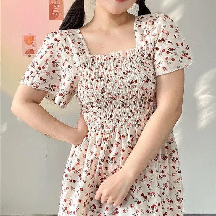 Blomstret midikjole i chiffon for kvinner