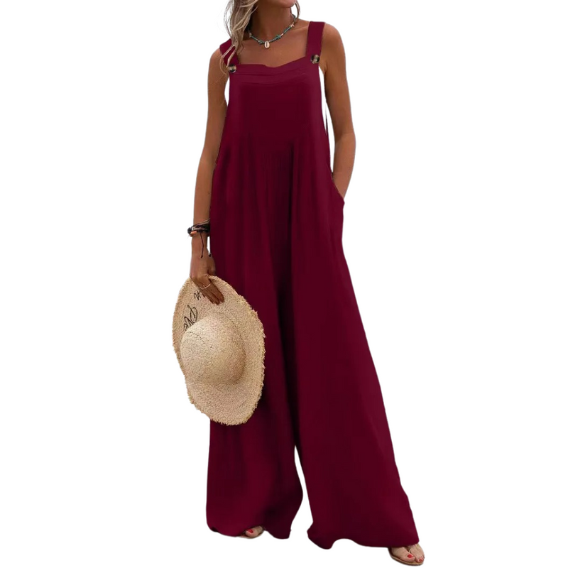 Ensfarget jumpsuit med bukseseler til dame