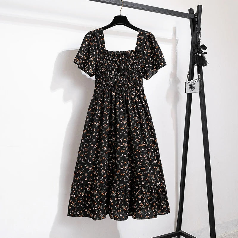 Blomstret midikjole i chiffon for kvinner